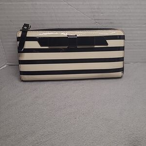Kate Spade black and white striped  zip around wallet white bows print inside